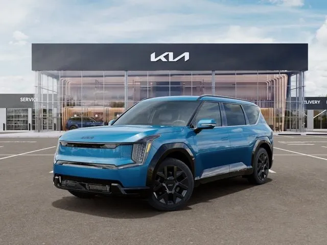 2026 Kia EV9 Land in Ocean Blue — front three-quarter view