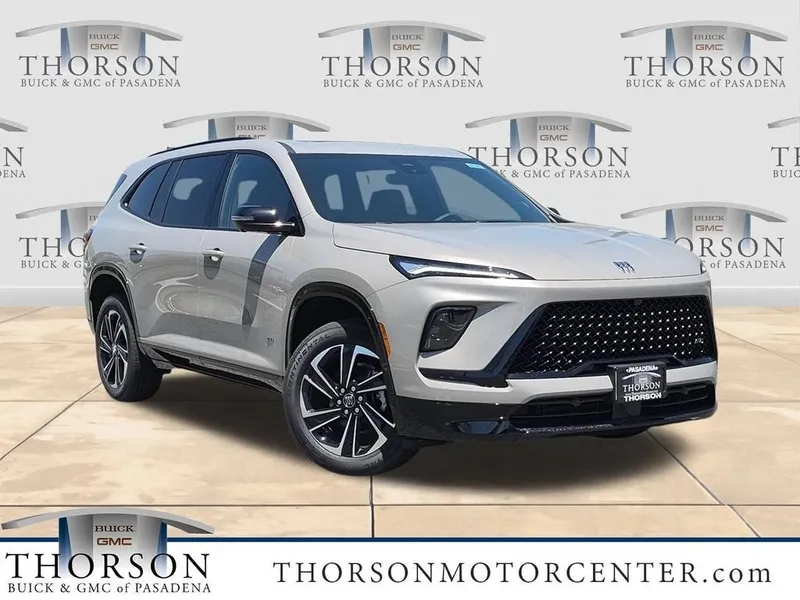 2026 Buick Enclave Sport Touring in Stone Metallic — front three-quarter view