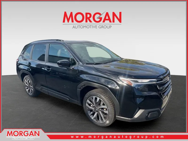 2026 Subaru Forester Touring in Crystal Black Silica — front three-quarter view