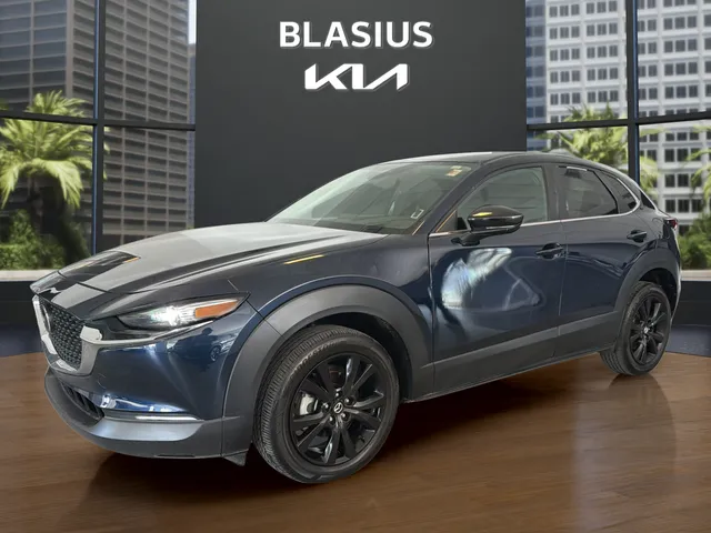 2024 Mazda Mazda CX-30 2.5 S Select Sport in Deep Crystal Blue Mica — front three-quarter view