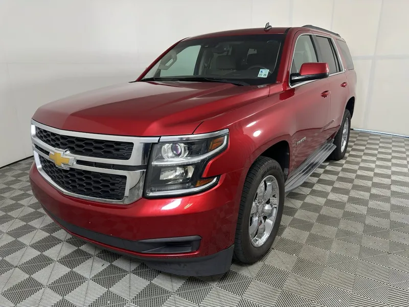 2015 Chevrolet Tahoe LT in Crystal Red Tintcoat — front three-quarter view