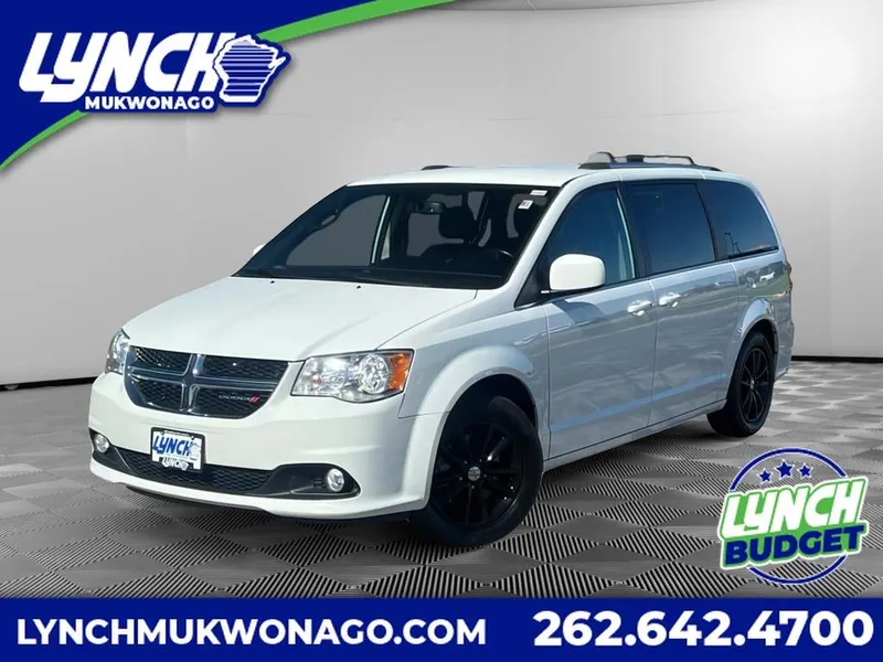 2018 Dodge Grand Caravan SXT in White Knuckle Clearcoat — front three-quarter view