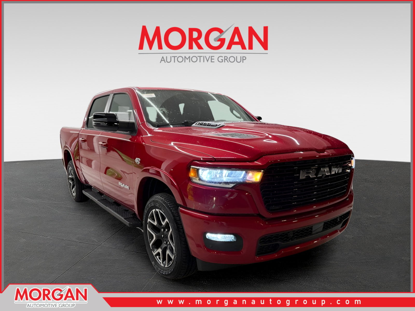 2026 Ram 1500 Laramie in Molten Red Pearlcoat — front three-quarter view