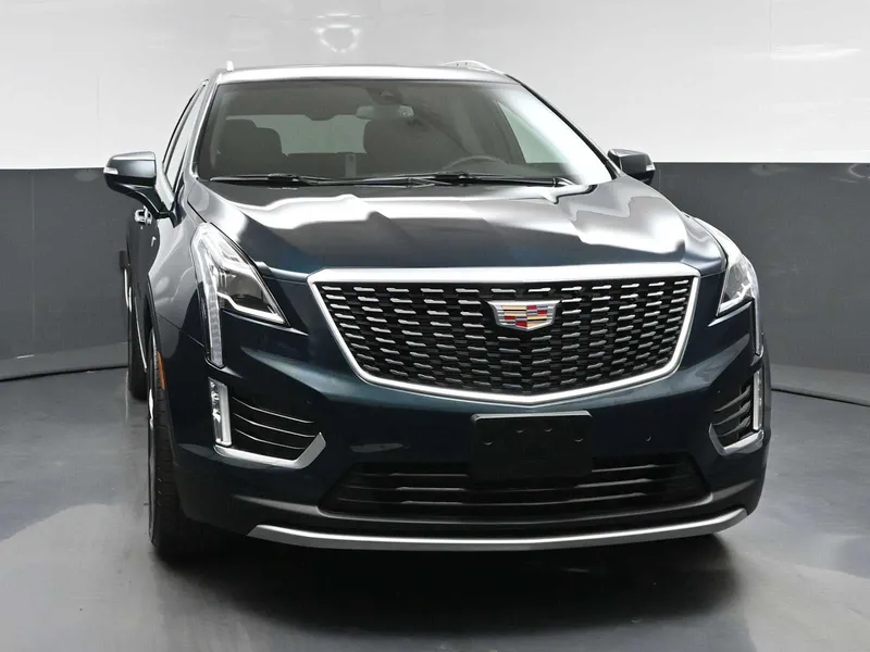 2025 Cadillac XT5 Premium Luxury in Emerald Lake Metallic — front three-quarter view