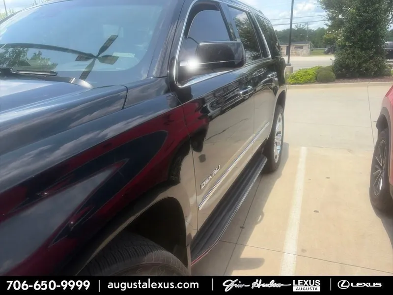 2016 GMC Yukon Denali BACKED BY HUDSON in Onyx Black — front three-quarter view