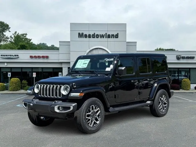 2026 Jeep Wrangler Sahara in Black Clear-Coat Exterior Paint — front three-quarter view