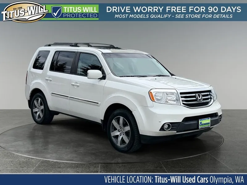 2013 Honda Pilot Touring in White — front three-quarter view