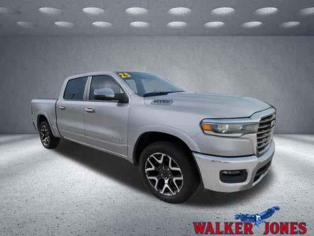 2025 RAM 1500 Laramie in Silver — front three-quarter view