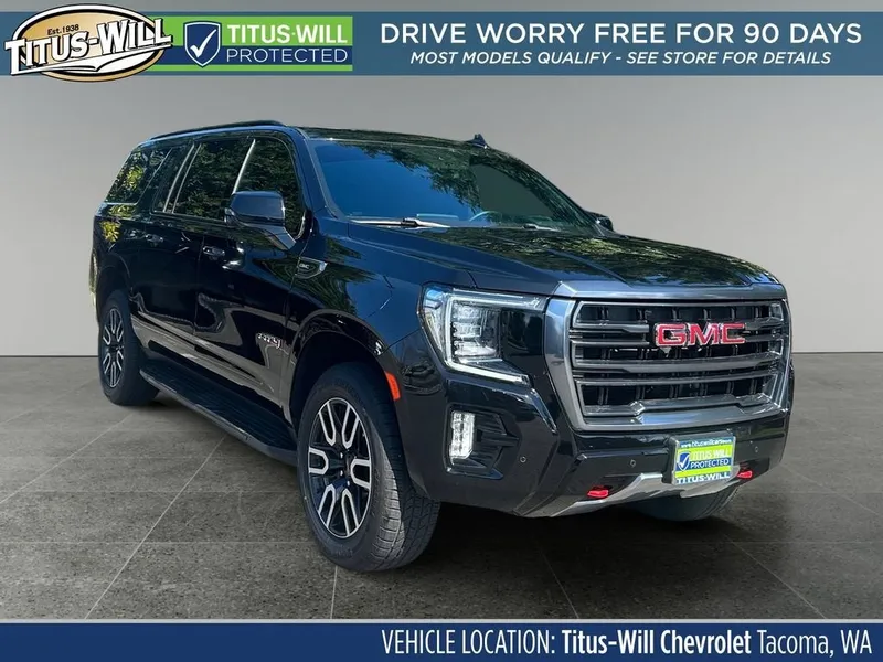 2024 GMC Yukon XL AT4 in Onyx Black — front three-quarter view