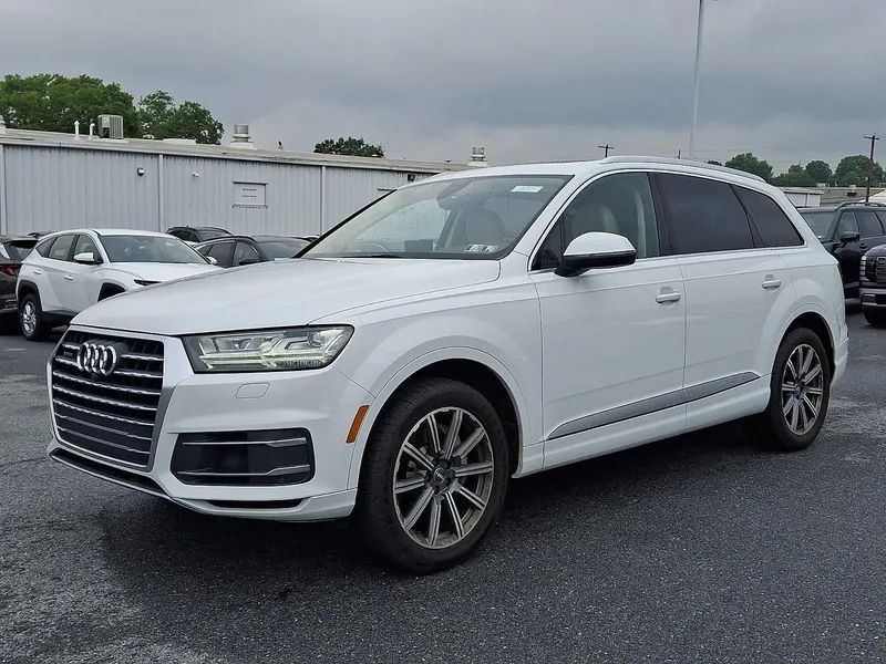 2017 Audi Q7 Premium Plus in Tofana White Crystal Effect — front three-quarter view