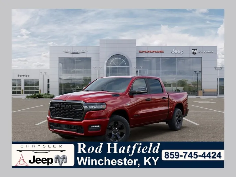 2026 RAM Ram 1500 RAM 1500 BIG HORN CREW CAB 4X4 5'7' BOX in Molten Red Pearl-Coat Exterior Paint — front three-quarter view
