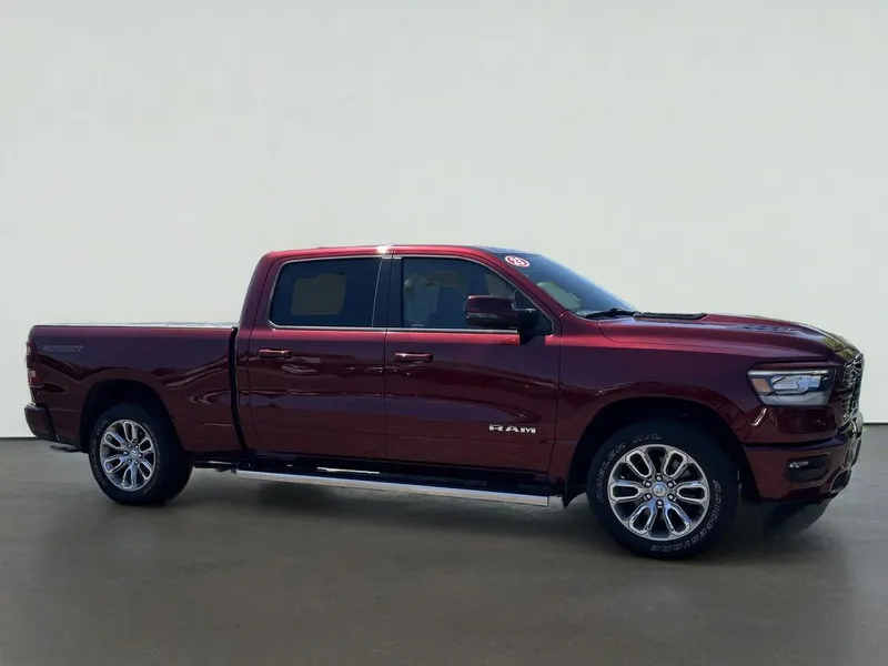 2023 RAM 1500 Laramie Crew Cab 4x4 6'4' Box in Delmonico Red Pearlcoat — front three-quarter view