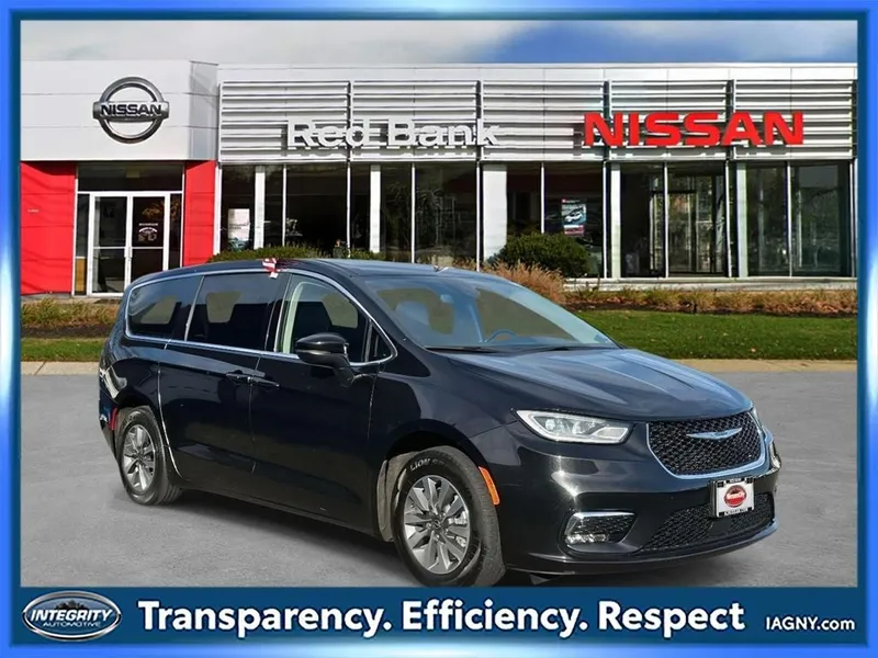2023 Chrysler Pacifica Hybrid Touring L in Brilliant Black Crystal Pearlcoat — front three-quarter view