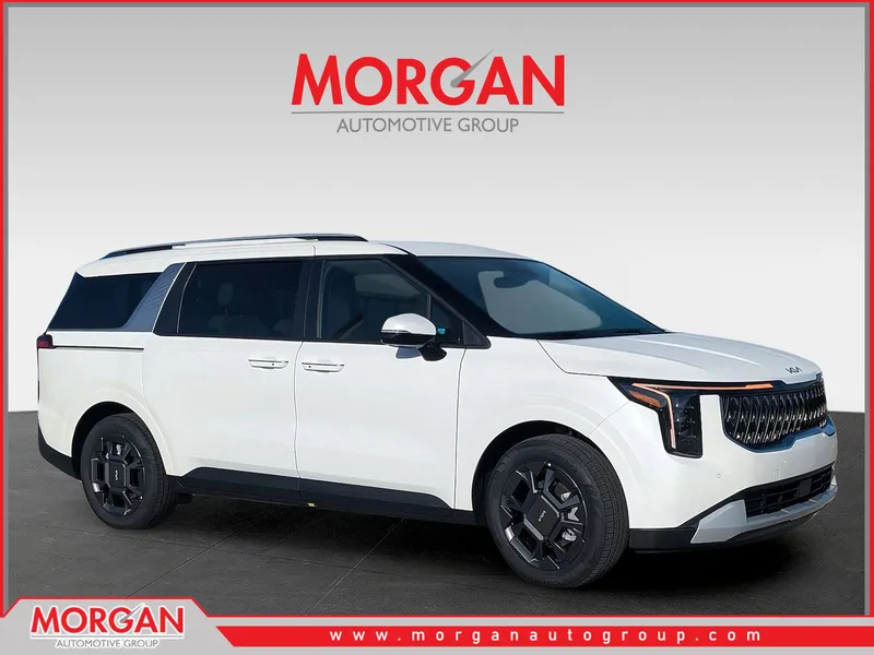 2026 Kia Carnival Hybrid EX in Snow White Pearl — front three-quarter view
