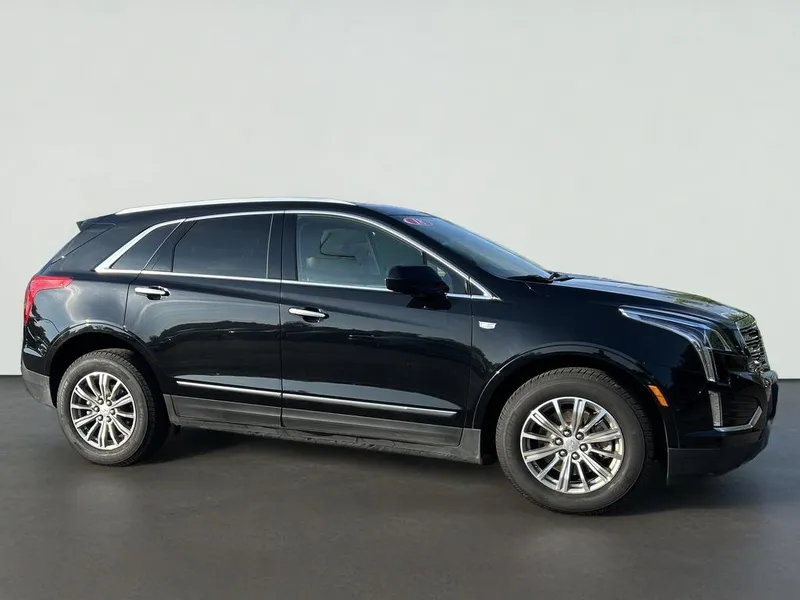 2018 Cadillac XT5 Luxury in Stellar Black Metallic — front three-quarter view