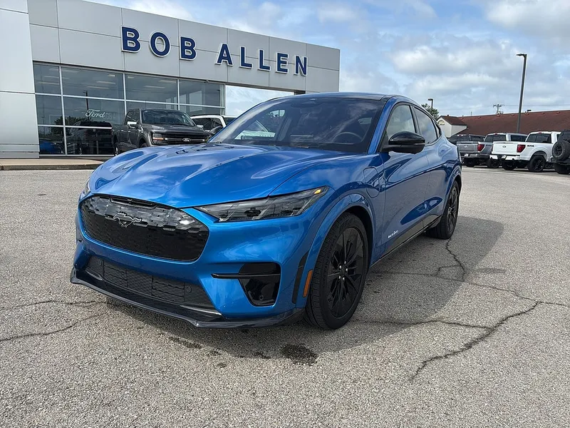 2025 Ford Mustang Mach-E GT in Velocity Blue — front three-quarter view