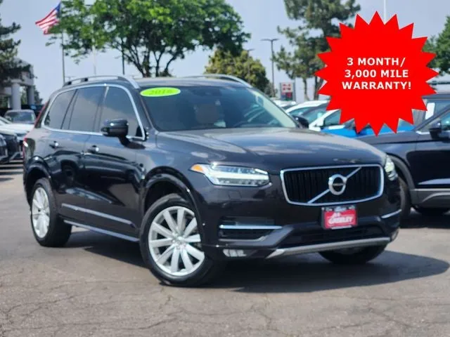 2016 Volvo XC90 T6 Momentum in Ember Black — front three-quarter view