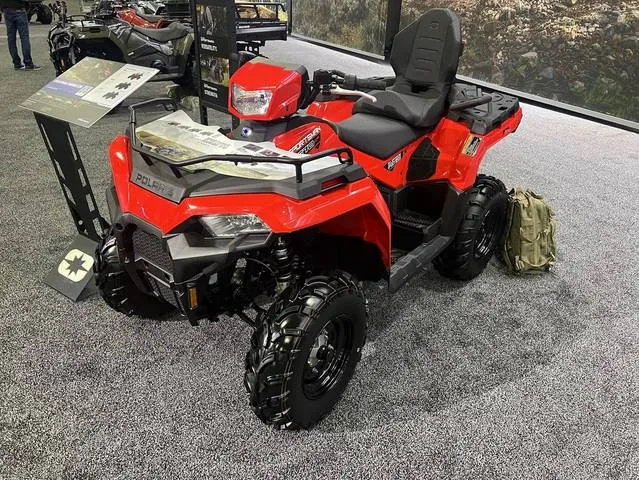2026 Polaris® Sportsman Touring 570 Indy Red — front three-quarter view