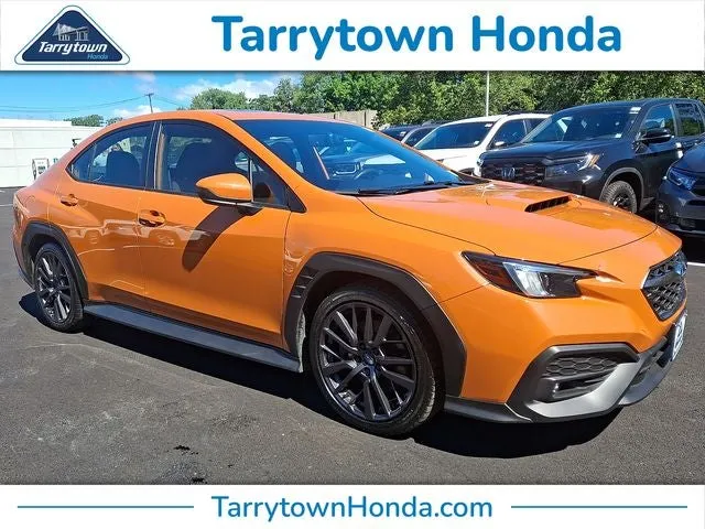 2022 Subaru WRX Premium in Solar Orange Pearl — front three-quarter view