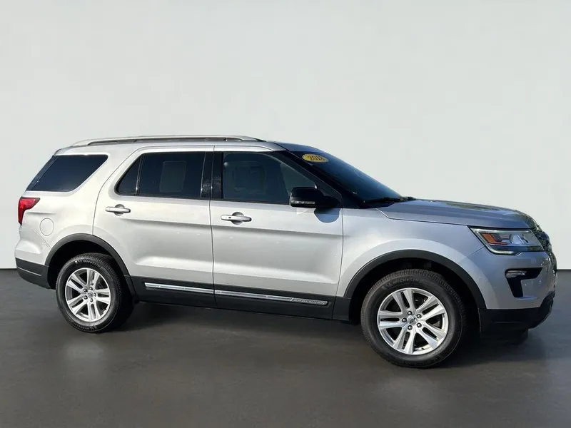 2018 Ford Explorer XLT in Silver — front three-quarter view
