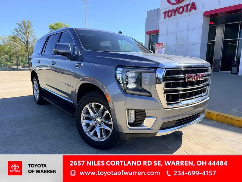 2022 GMC Yukon SLT in Satin Steel Metallic — front three-quarter view
