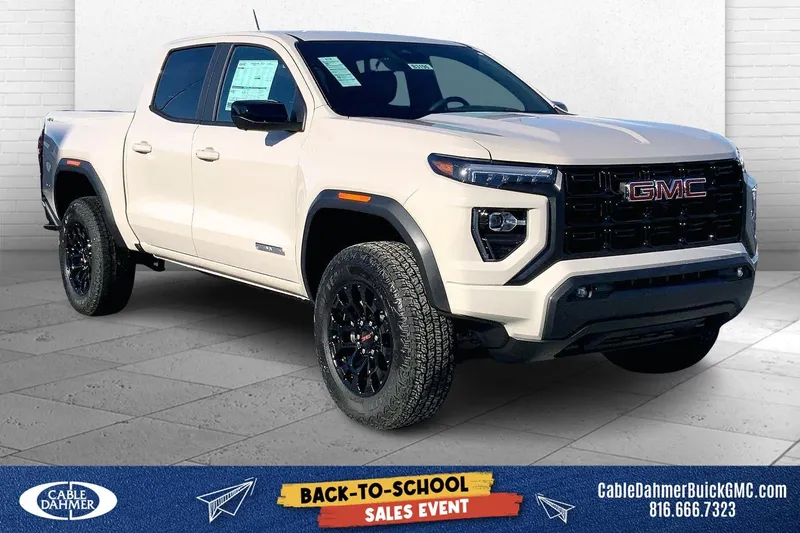 2026 GMC Canyon Elevation in Coastal Dune — front three-quarter view