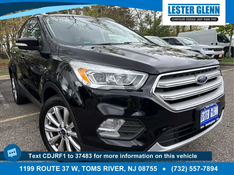 2017 Ford Escape Titanium in Shadow Black — front three-quarter view
