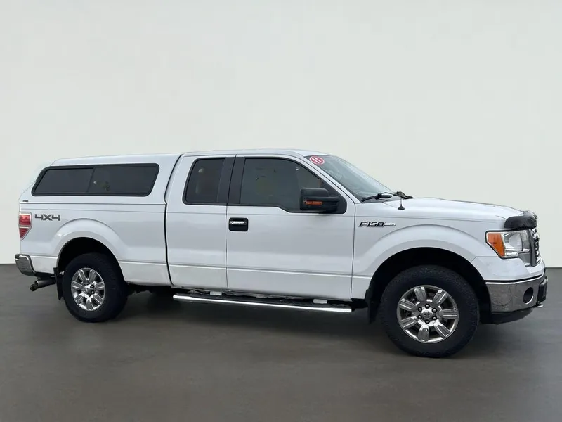 2011 Ford F-150 XLT in .White — front three-quarter view