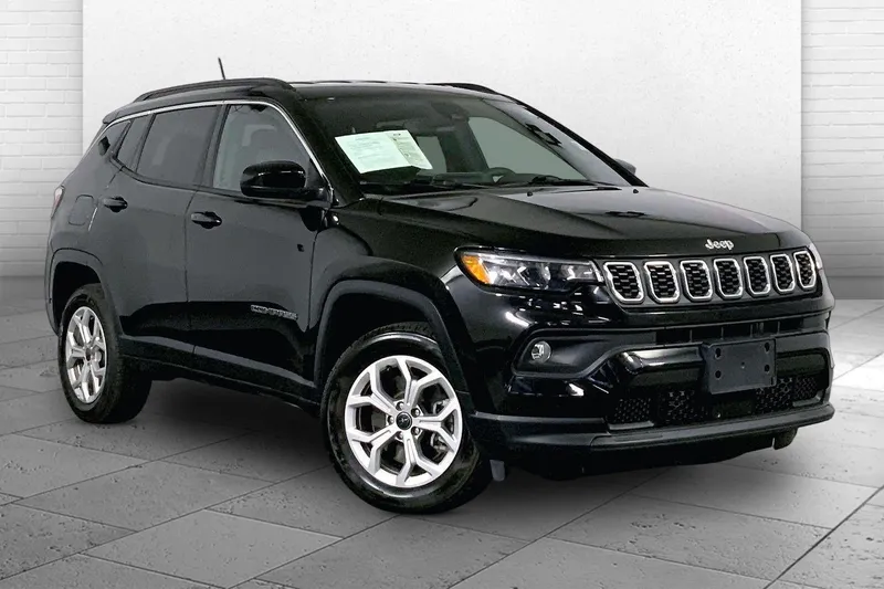 2025 Jeep Compass Latitude in Diamond Black Cry — front three-quarter view