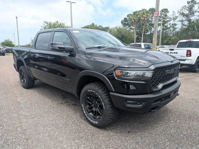 2026 RAM 1500 Rebel in Diamond Black Crystal Pearl-Coat Exterior Paint — front three-quarter view