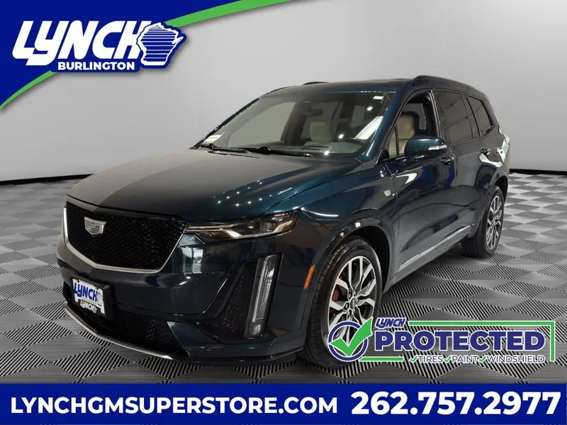 2024 Cadillac XT6 Sport in Emerald Lake Metallic — front three-quarter view
