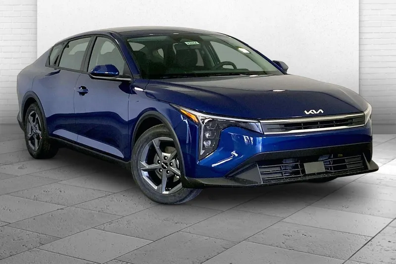 2026 Kia K4 LXS in Deep Sea Blue — front three-quarter view