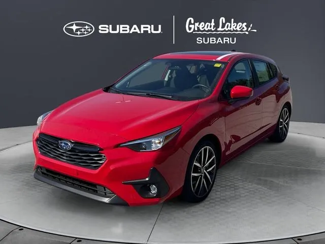 2026 Subaru IMPREZA Sport in Pure Red — front three-quarter view