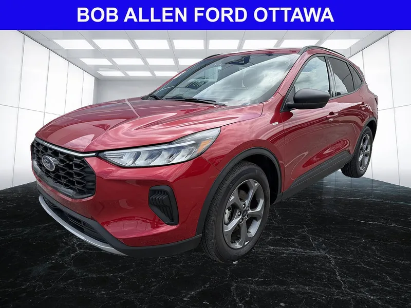 2025 Ford Escape ST-Line in Rapid Red Metallic Tinted Clearcoat — front three-quarter view