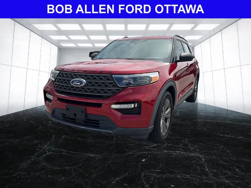 2021 Ford Explorer XLT in Rapid Red Metallic Tinted Clearcoat — front three-quarter view