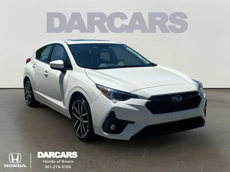 2024 Subaru Impreza Sport in Crystal White Pearl — front three-quarter view