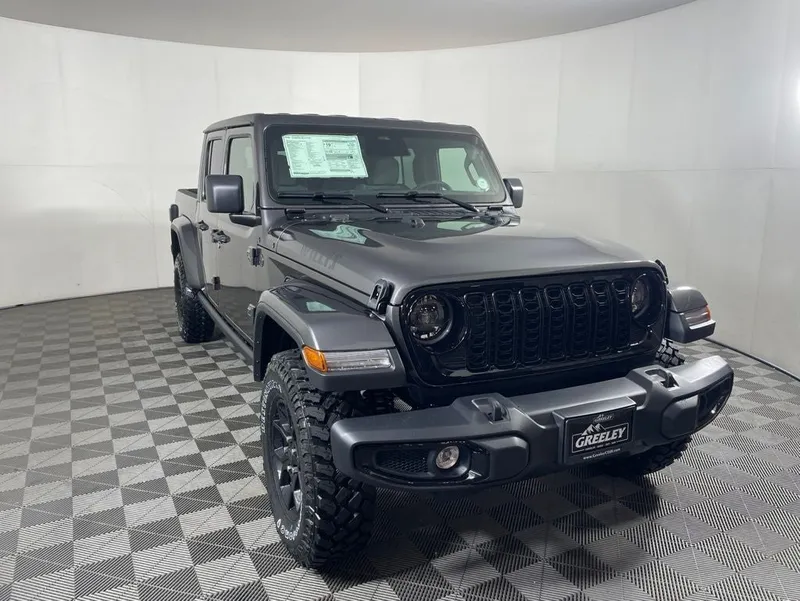 2026 Jeep Gladiator GLADIATOR WILLYS 4X4 in Granite Crystal Metallic Clear-Coat Exterior Paint — front three-quarter view