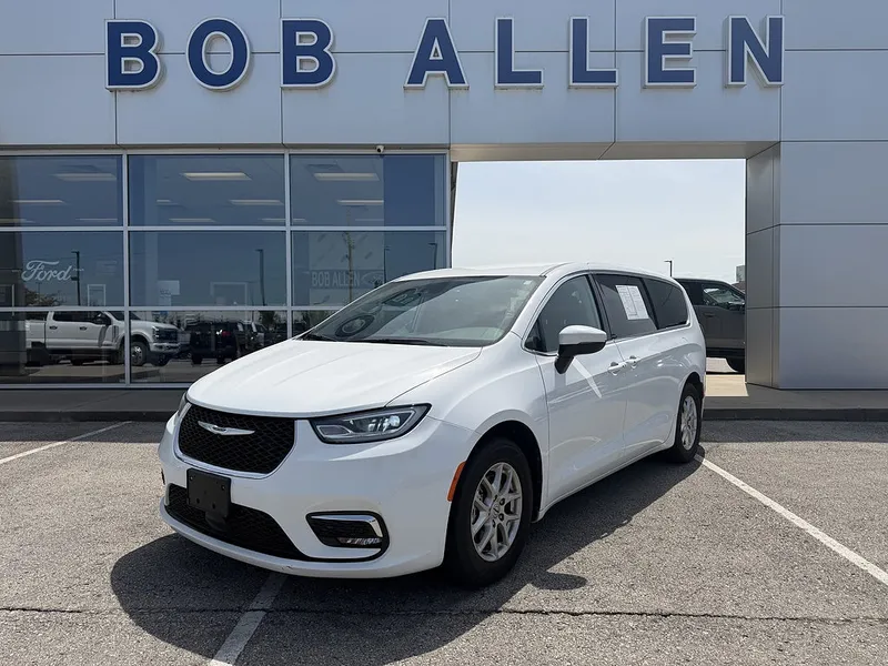 2023 Chrysler Pacifica Touring L in Bright White Clear Coat — front three-quarter view