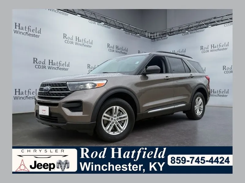 2021 Ford Explorer XLT in Stone Gray Metallic — front three-quarter view