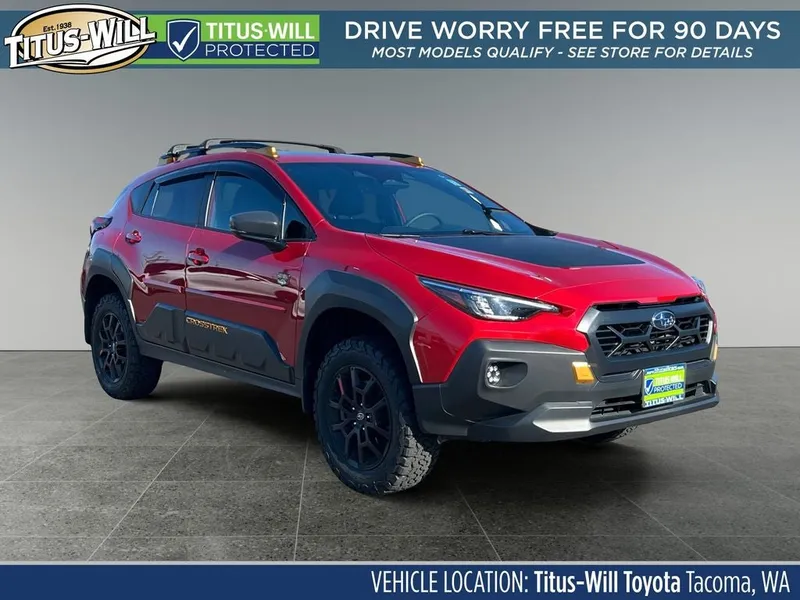 2024 Subaru Crosstrek Wilderness in Lithium Red Pearl — front three-quarter view