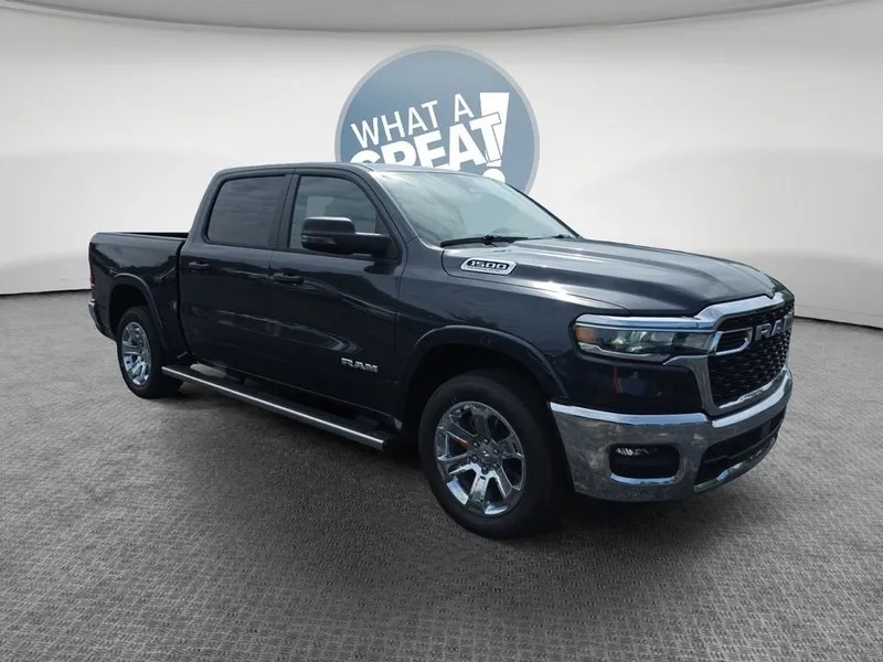 2026 RAM 1500 Big Horn/Lone Star in Forged Blue Metallic — front three-quarter view