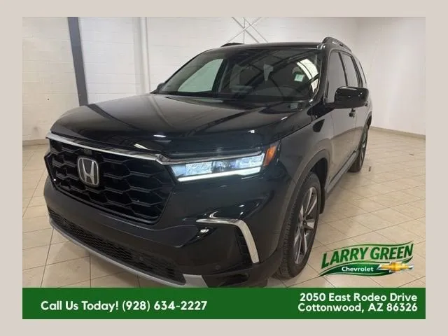 2024 Honda Pilot Elite in Black — front three-quarter view