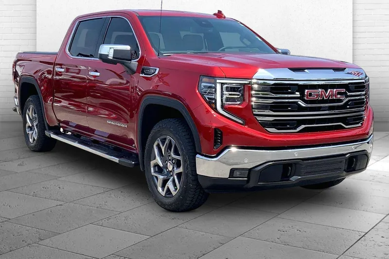 2026 GMC Sierra 1500 SLT in Volcanic Red Tintcoat — front three-quarter view