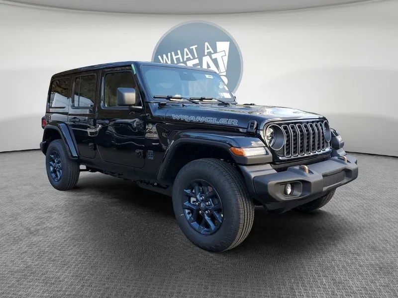 2026 Jeep Wrangler WRANGLER 4-DOOR 85TH ANNIVERSARY EDITION in Black Clear-Coat Exterior Paint — front three-quarter view