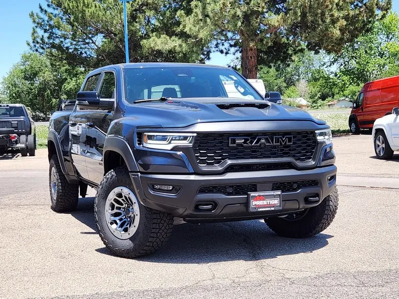 2026 RAM 1500 RAM 1500 RHO CREW CAB 4X4 5'7' BOX in Forged Blue Metallic Exterior Paint — front three-quarter view