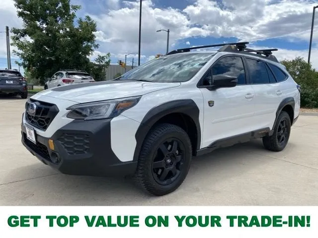 2024 Subaru Outback Wilderness in Crystal White Pearl — front three-quarter view