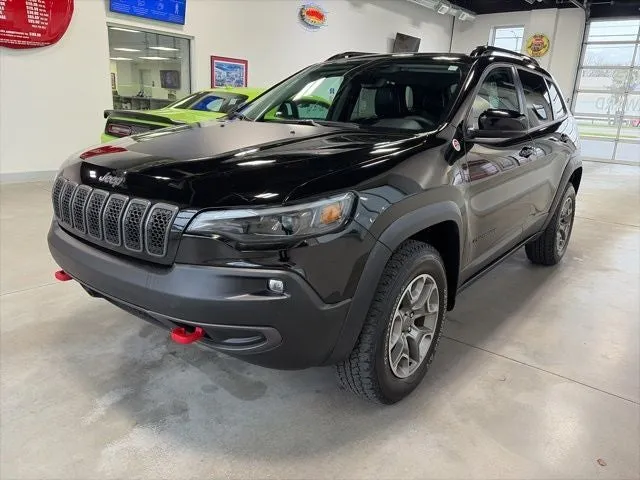 2022 Jeep Cherokee Trailhawk 4x4 in Diamond Black Crystal Pearlcoat — front three-quarter view