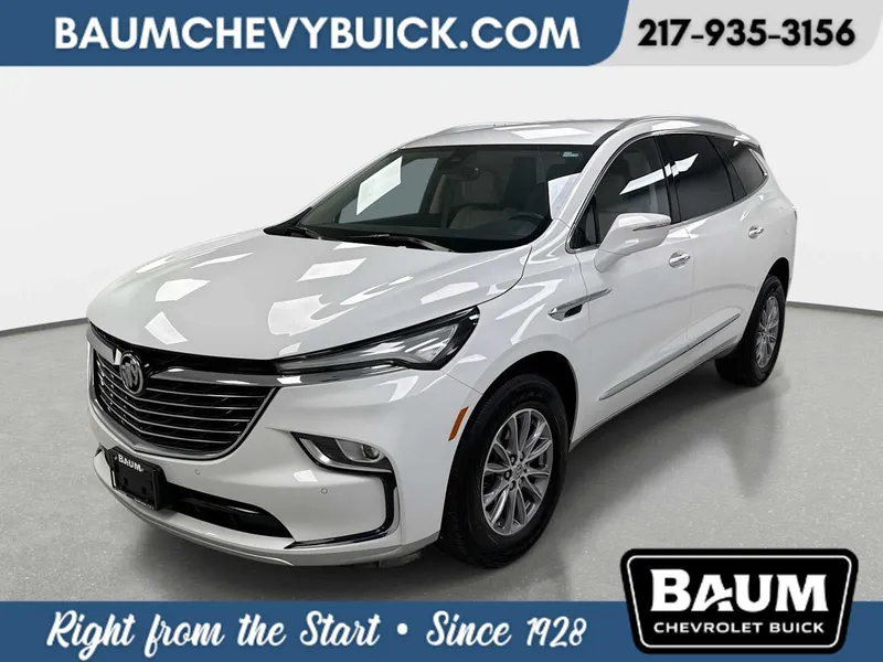 2023 Buick Enclave Essence in Summit White — front three-quarter view