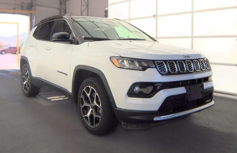 2025 Jeep Compass Limited 4x4 in Bright White Clearcoat — front three-quarter view