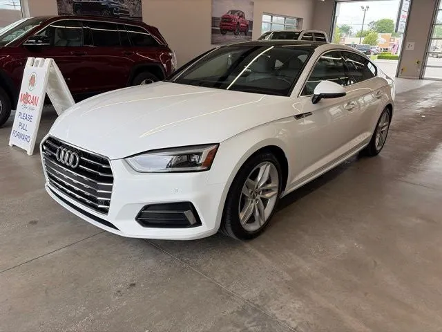 2019 Audi A5 45 Premium in Ibis White — front three-quarter view